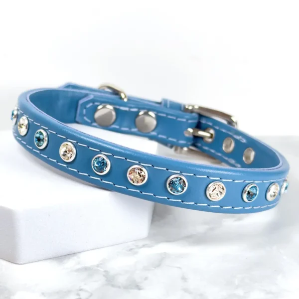 A blue leather dog collar with Swarovski crystals, handmade by Petiquette Collars