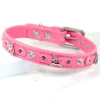 a candyfloss pink leather dog collar with christmas charms and Swarovski crystals made by Petiquette
