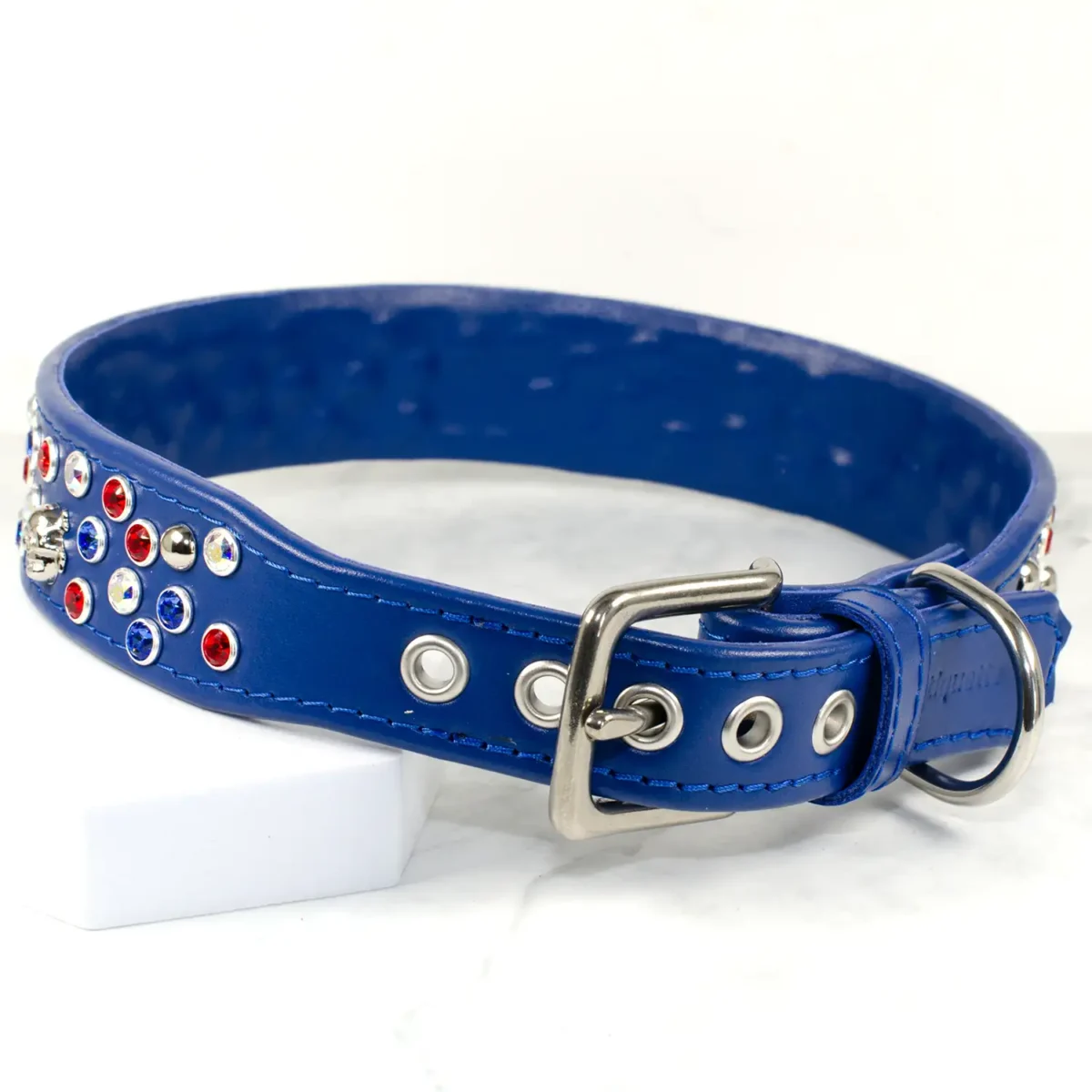 A wide leather dog collar in bright blue with swarovski crystals and stainless steel buckle, handmade by Petiquette