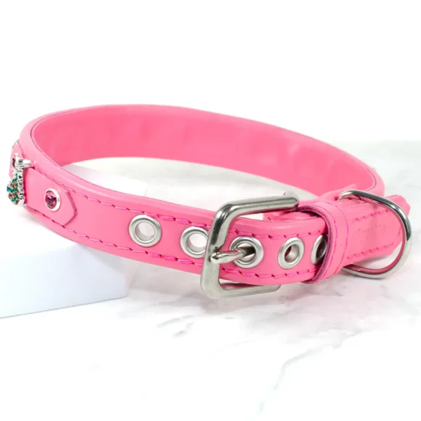 a handmade pink leather dog collar with Christmas charms and solid stainless steel buckle.