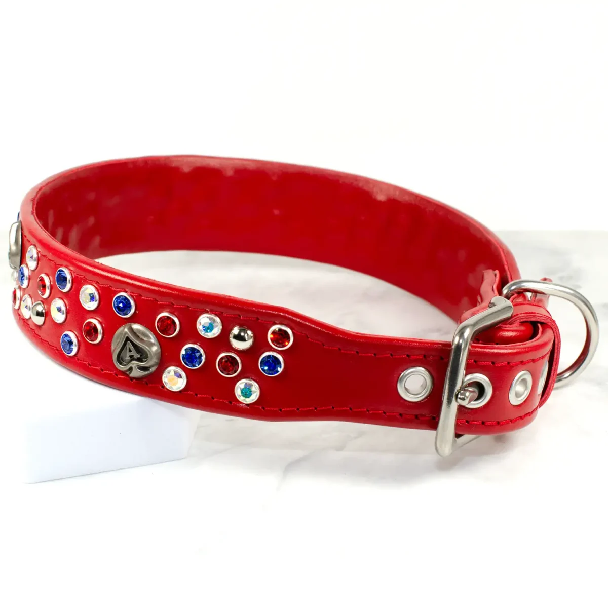A tapered crystal dog collar in red leather with Swarovski crystals made by Petiquette Collars