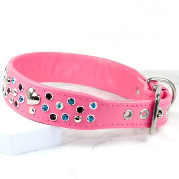 a wide pink leather dog collar with heart-shaped studs, handmade by Petiquette