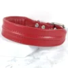 A wide red leather dog collar with a ridged accent, handmade by Petiquette Collars