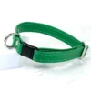 a green leather cat collar handmade by Petiquette
