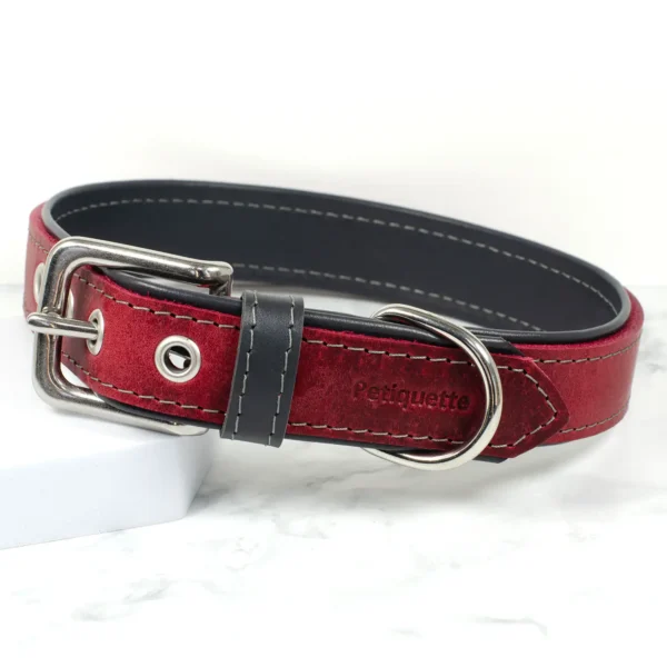 An oxblood and school grey coloured leather dog collar, handmade by Petiquette Collars