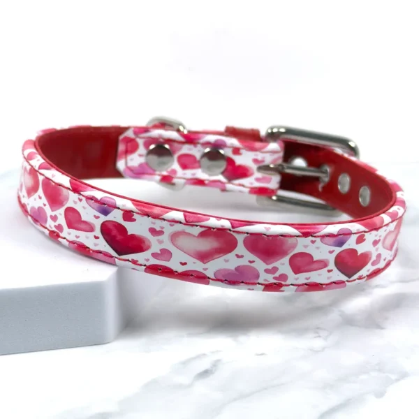 Sweetheart printed leather dog collar showing watercolour hearts in deep red, soft pink and purple on Italian calf leather