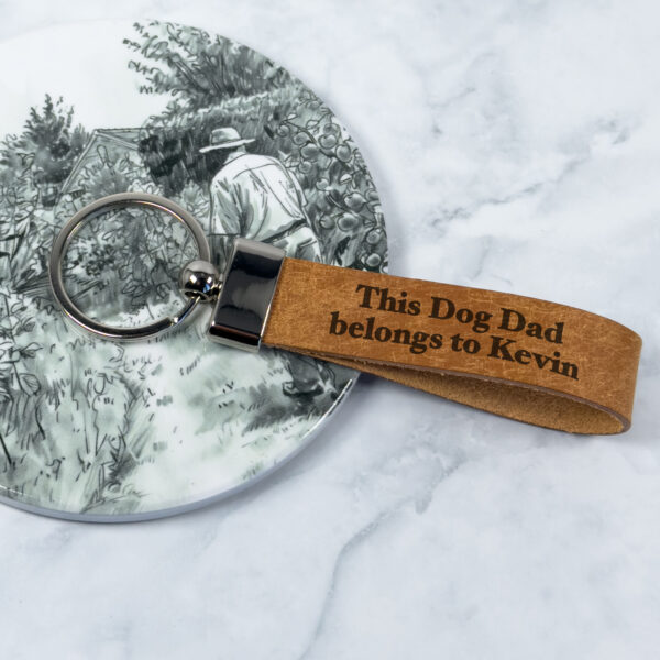 a personalised leather keyring from the dog to dad