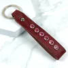 a burgundy leather keyring with swarovski crystal